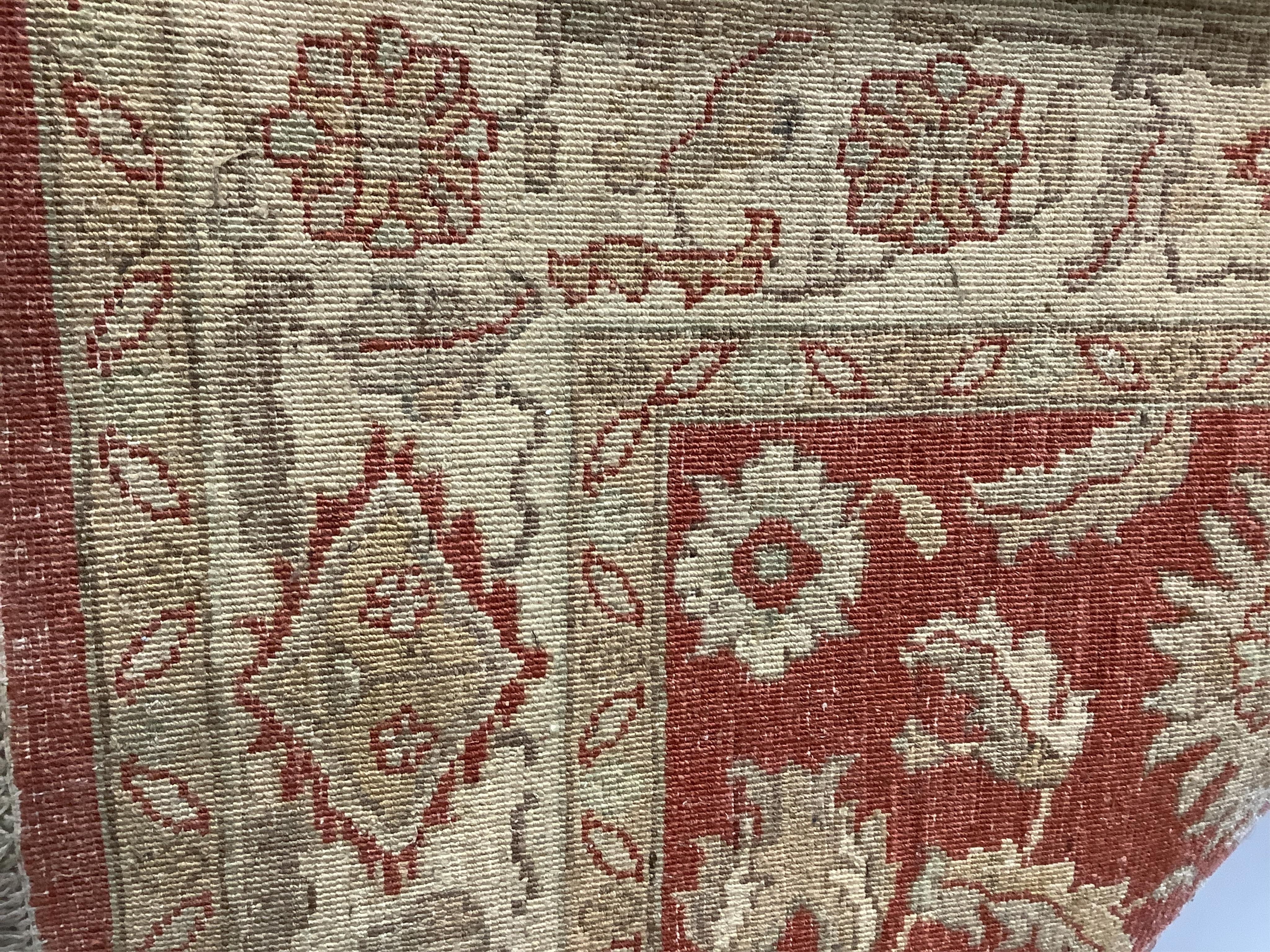 A Persian small carpet, 152 x 222cm. Condition - fair, red wine stain to one side